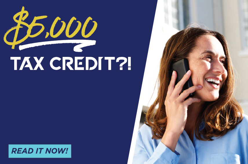Blog post graphic featuring a smiling woman talking on a smartphone Overlaid text on a dark blue background reads 5 000 TAX CREDIT with a READ IT NOW button in the bottom left corner